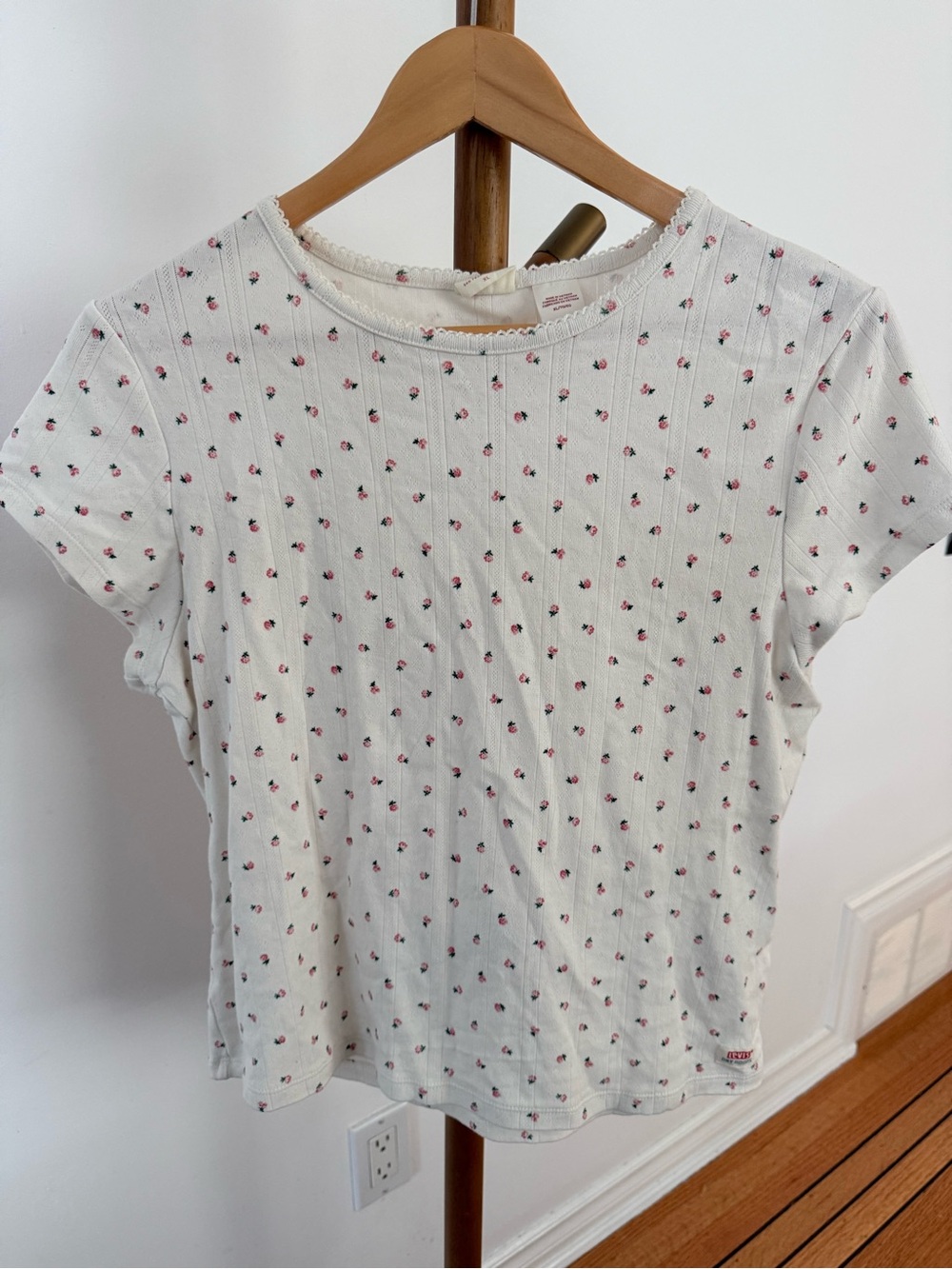 Levi's white tank with red logo and small pink floral print